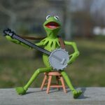 kermit the frog playing the banjo