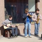 street musicians in the summer sun